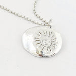 Hand Carved Silver Sun Necklace